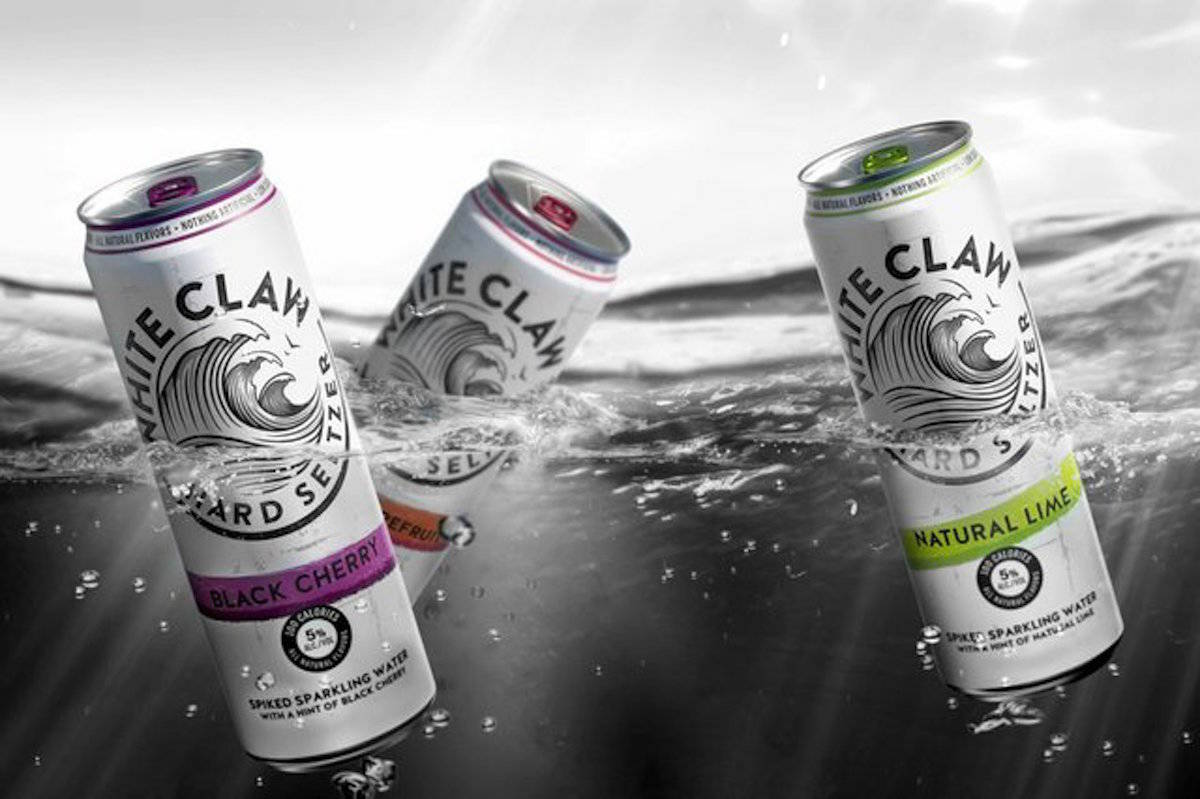 white claw hard seltzers submersed in water