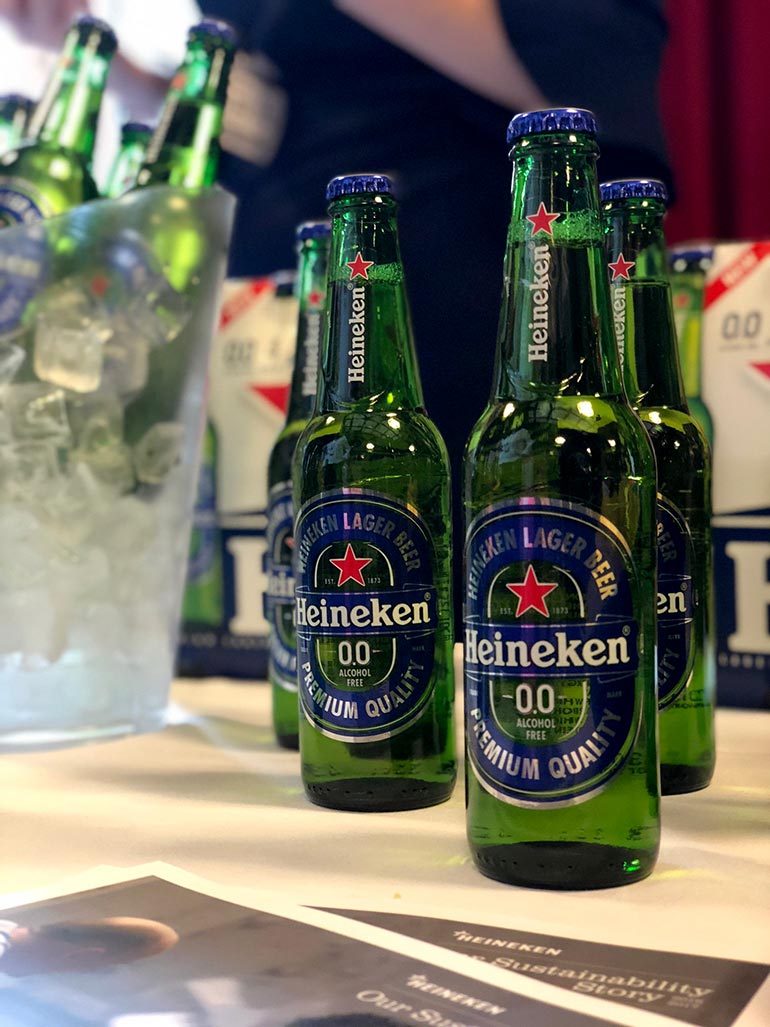 non-alcoholic heineken bottles with ice