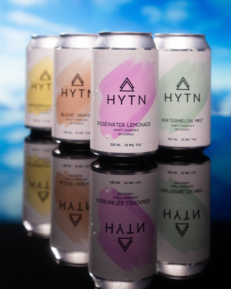 Cans hytn cannabis beverage on mirrored surface