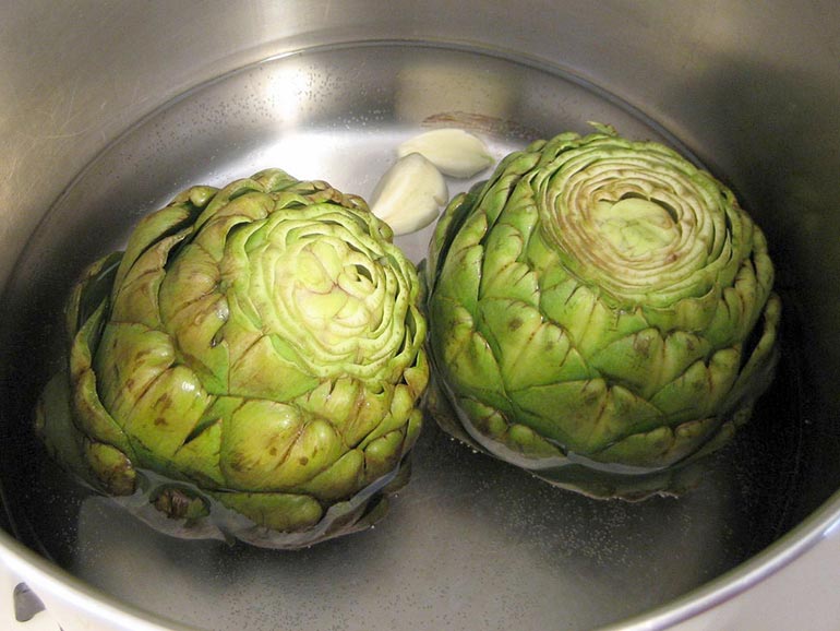 large artichokes in a pot