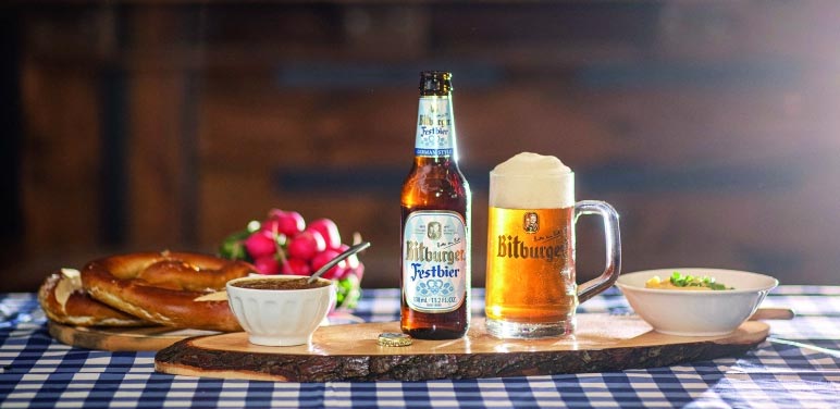 bitburger festbier in glass with lovely meal