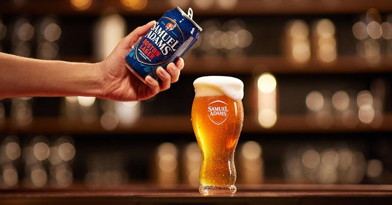 sam adams boston lager being poured from can