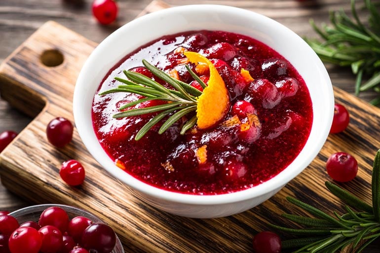 Cranberry-Orange Sauce with sprig of rosemary