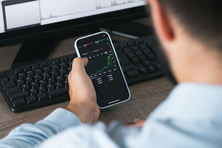 Person checking 1WinToken update on phone