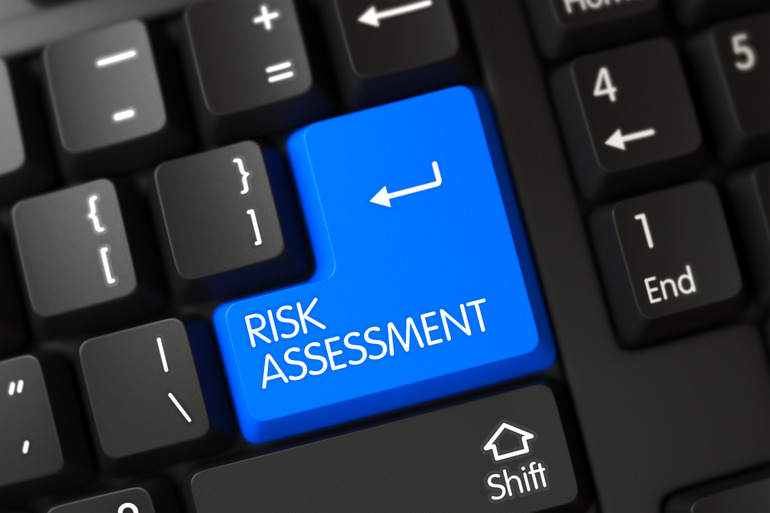 Blue Risk Assessment Key on Keyboard