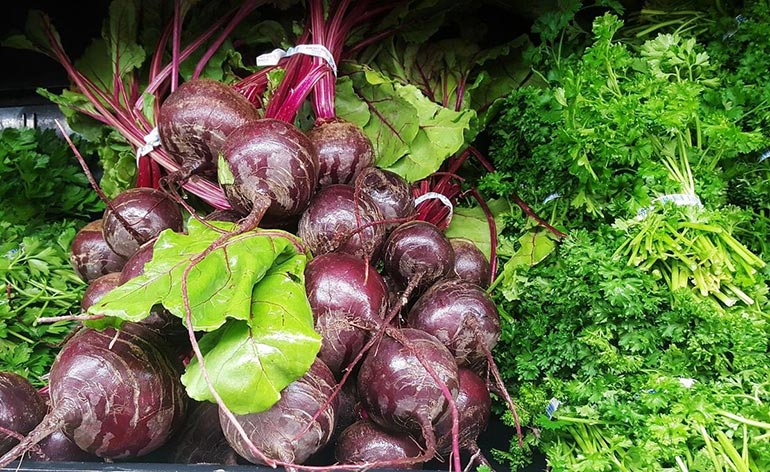 beets on a shelf at a supermarket