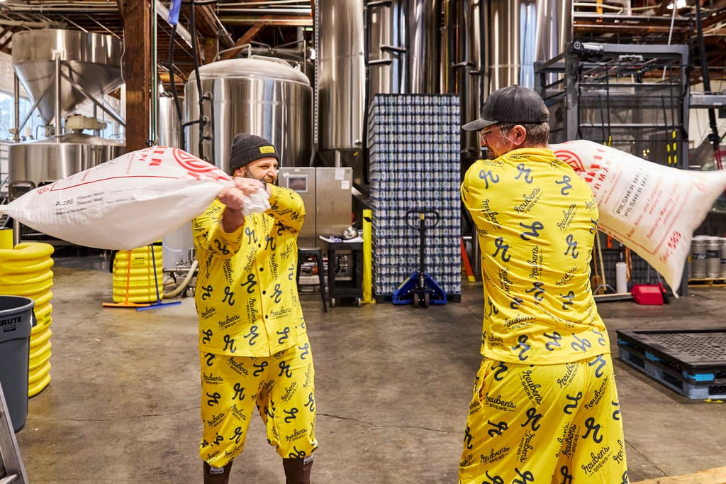 Reuben's Brews brewers have a pillow fight in the brewhouse
