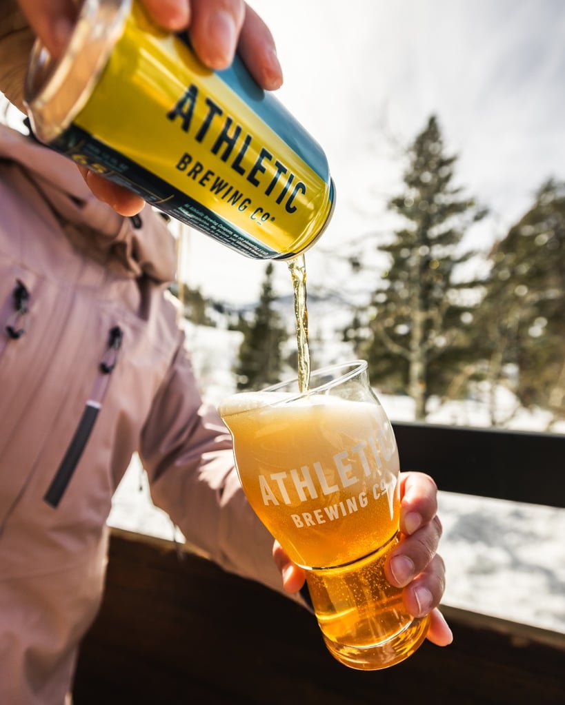 athletic brewing being imbibed after skiing