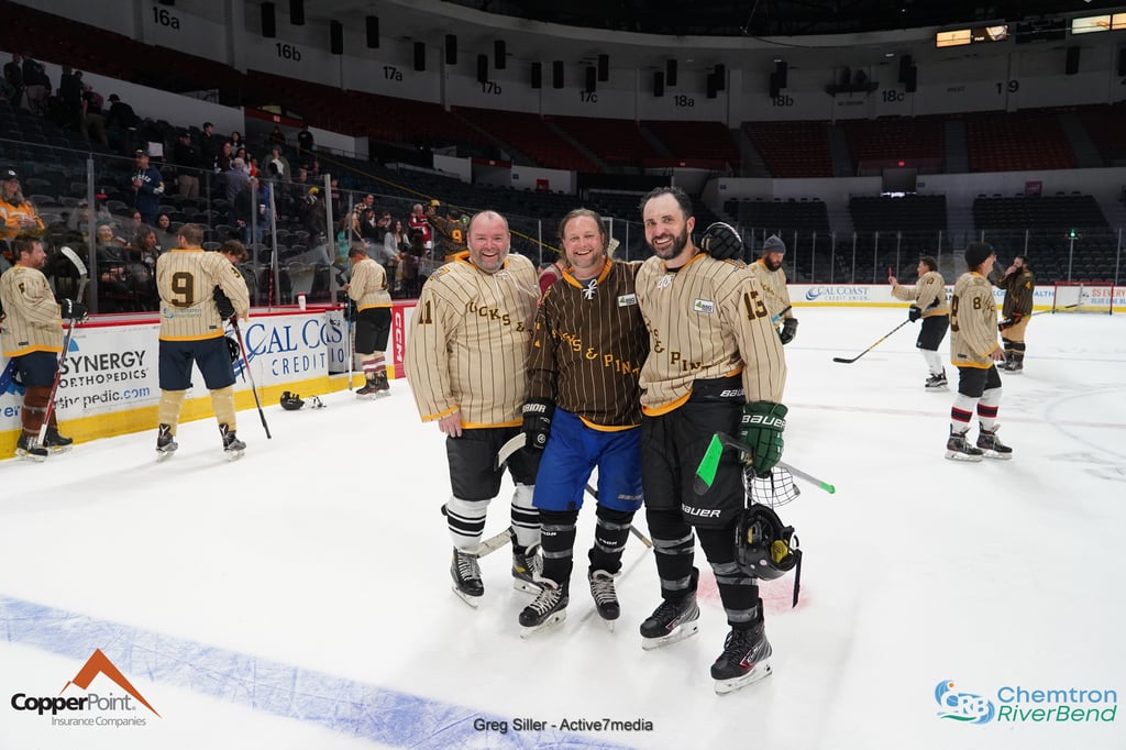pucks and pints players wearing the jersey