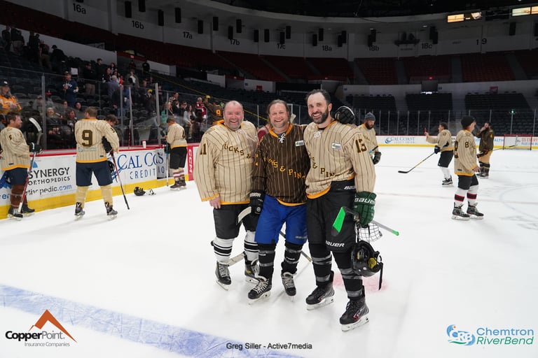 pucks and pints players wearing the jersey