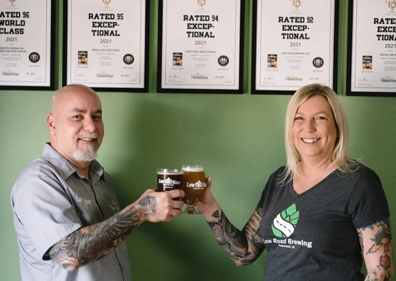 Owners of Low Road Brewing Cheers to Their The Beer Connoisseur Awards Certificates