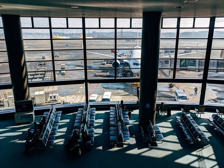 airport lounge with plane outside window