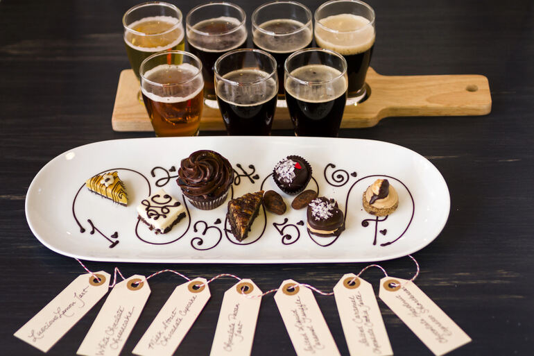 A selection of craft beers paired with an assortment of gourmet desserts