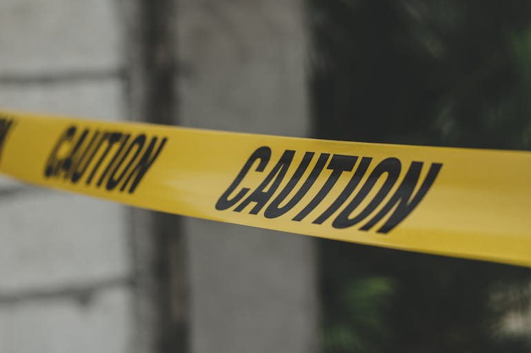 DUI checkpoint caution tape marking a restricted area