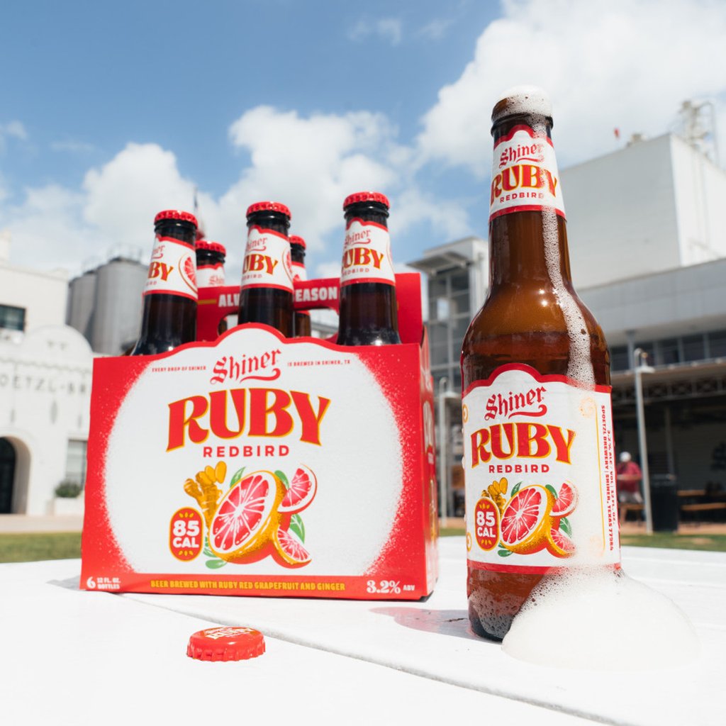 shiner ruby redbird six-pack of bottles outside the spoetzl brewery