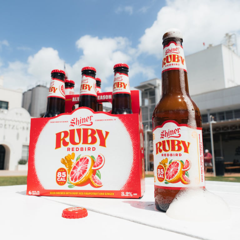 shiner ruby redbird six-pack of bottles outside the spoetzl brewery