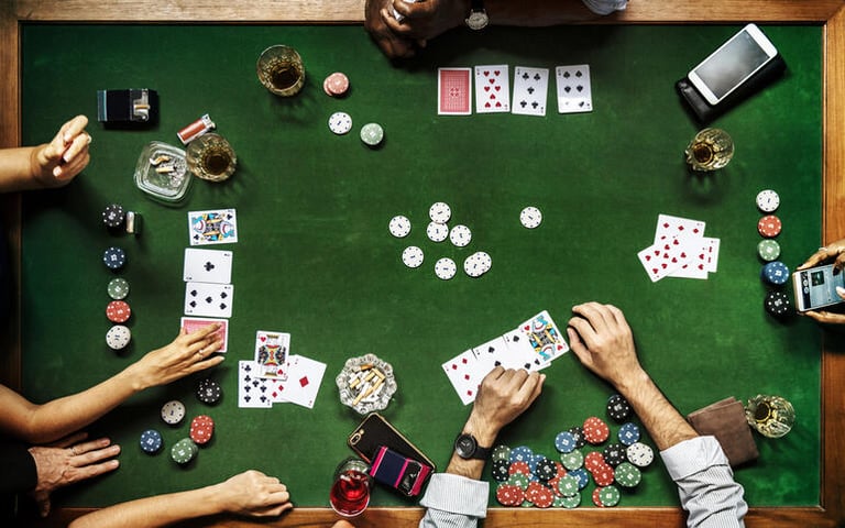 Players enjoying a poker game at a casino table