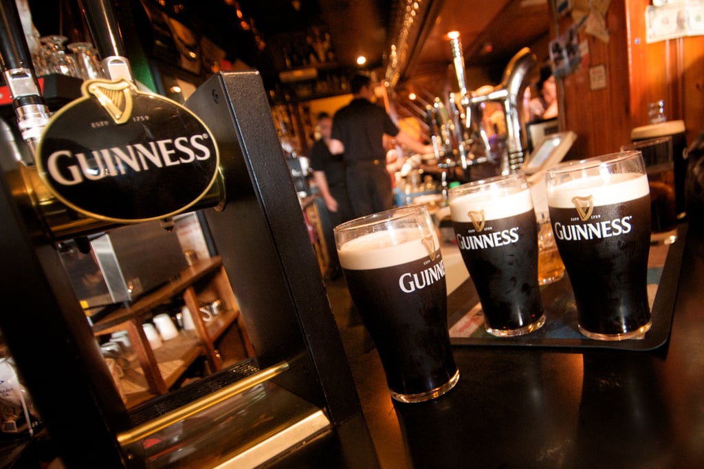 Guinness pints atop a bar