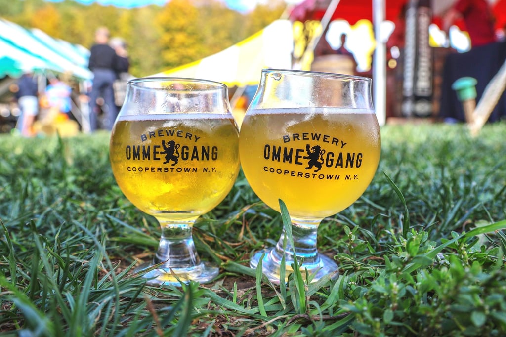 ommegang brewery glasses on ground during festival