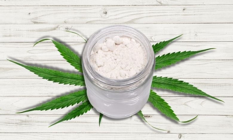 Cannabis leaf and THCA isolate in glass jar