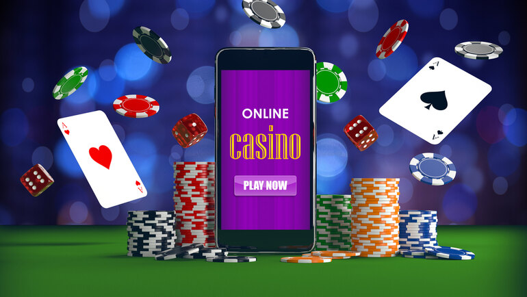 Online casino game on mobile with paying cards, poker chips, and dice around