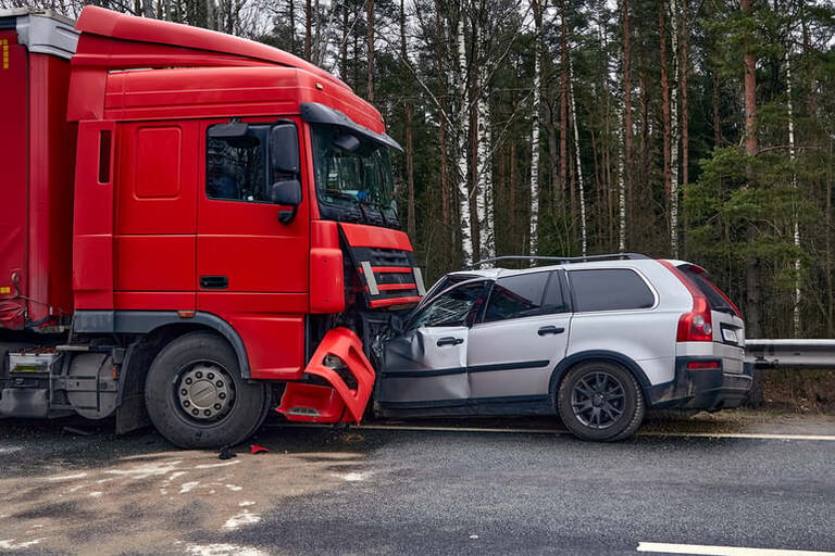 A red truck got into an accident with a car