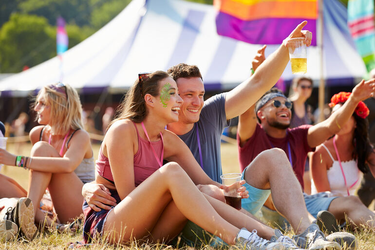 Beer lovers enjoying beers at a lively 2025 beer event