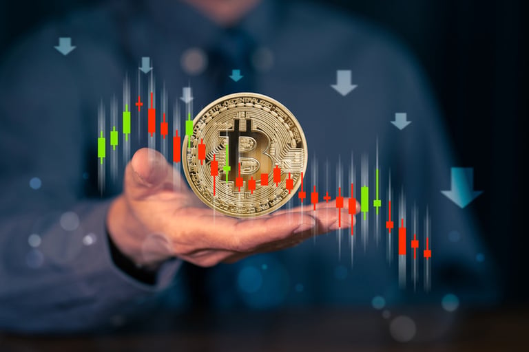 Businessman holding Bitcoin with declining cryptocurrency market graph illustrating Fear and Greed Index concept
