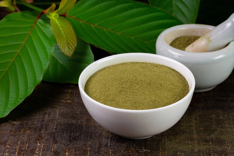 Real Botanicals kratom powder in a white ceramic bowl