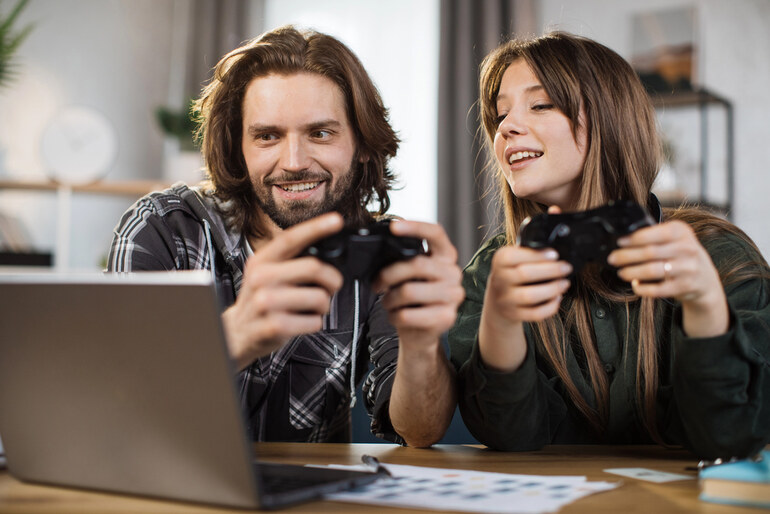 Two American regular gamers playing video games.