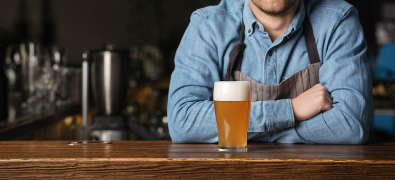 A gamer in a brewery taproom