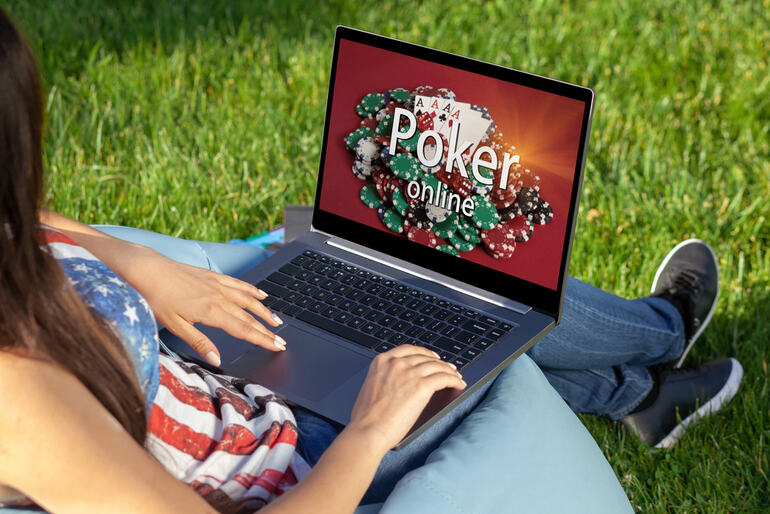 A woman is playing an online poker game in New Zealand