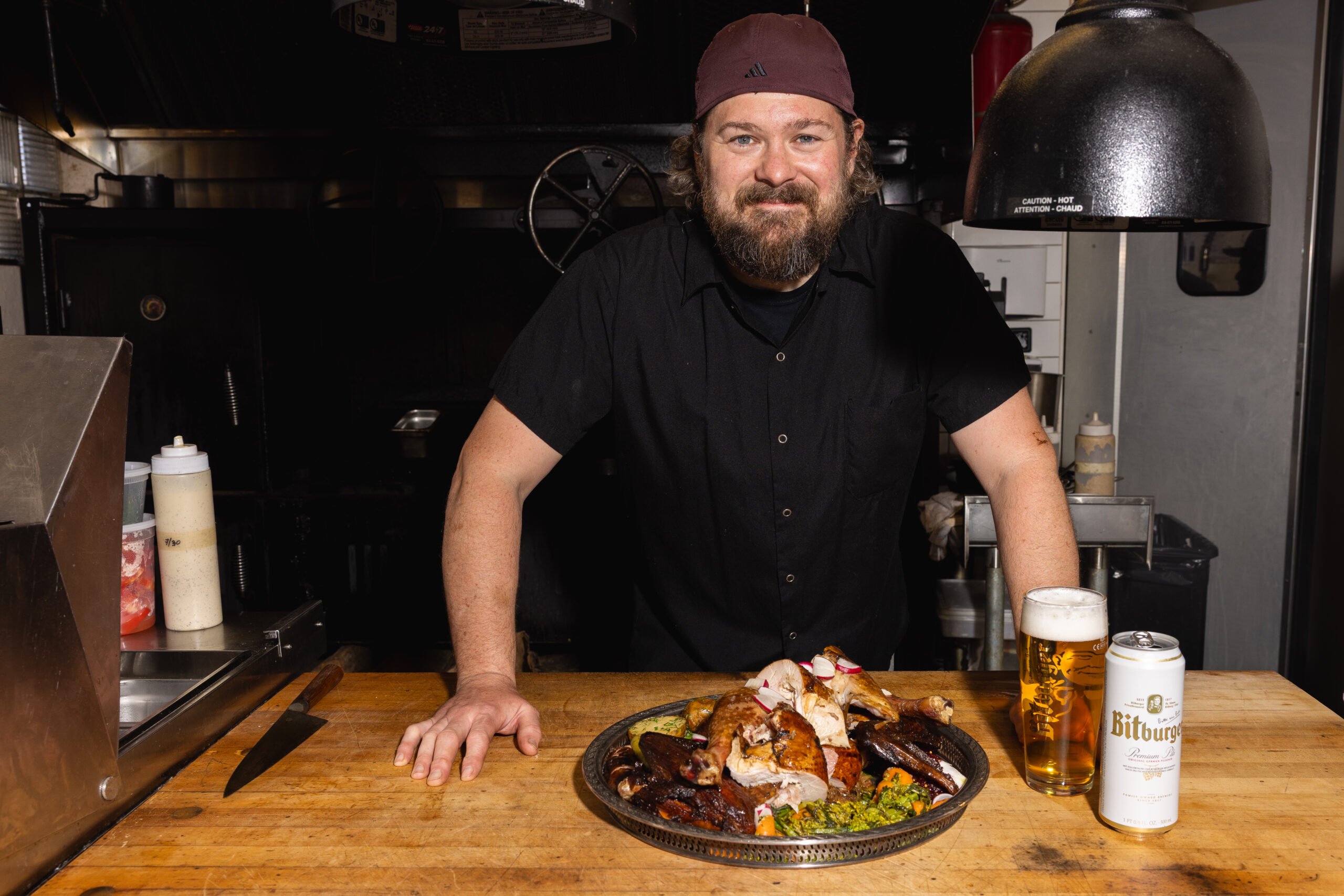 Chef Mike Brenfleck, with turkey and Bitburger Beer