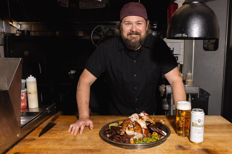 Chef Mike Brenfleck, with turkey and Bitburger Beer