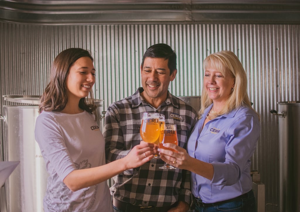 Ceria Staff Toasting Glasses of THC Drinks