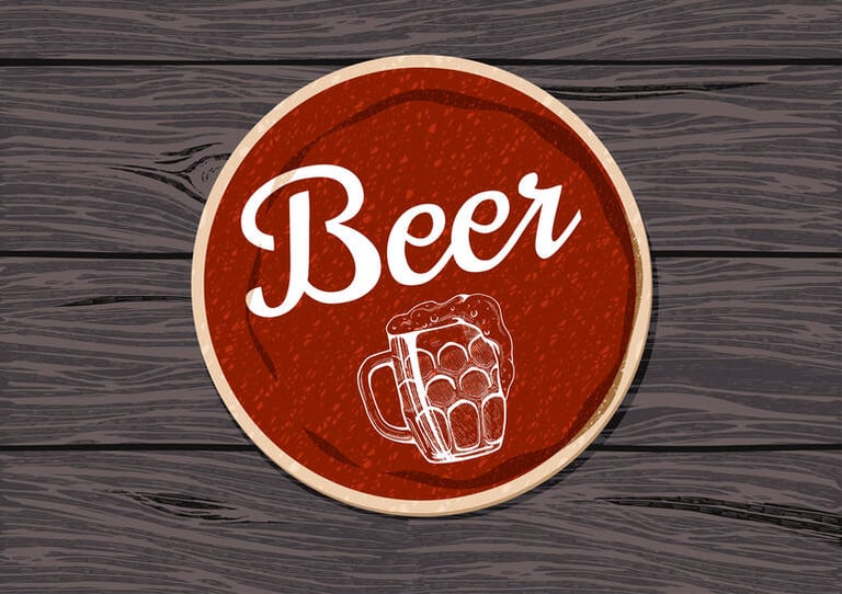 A logo containing a glass of beer and the word beer.