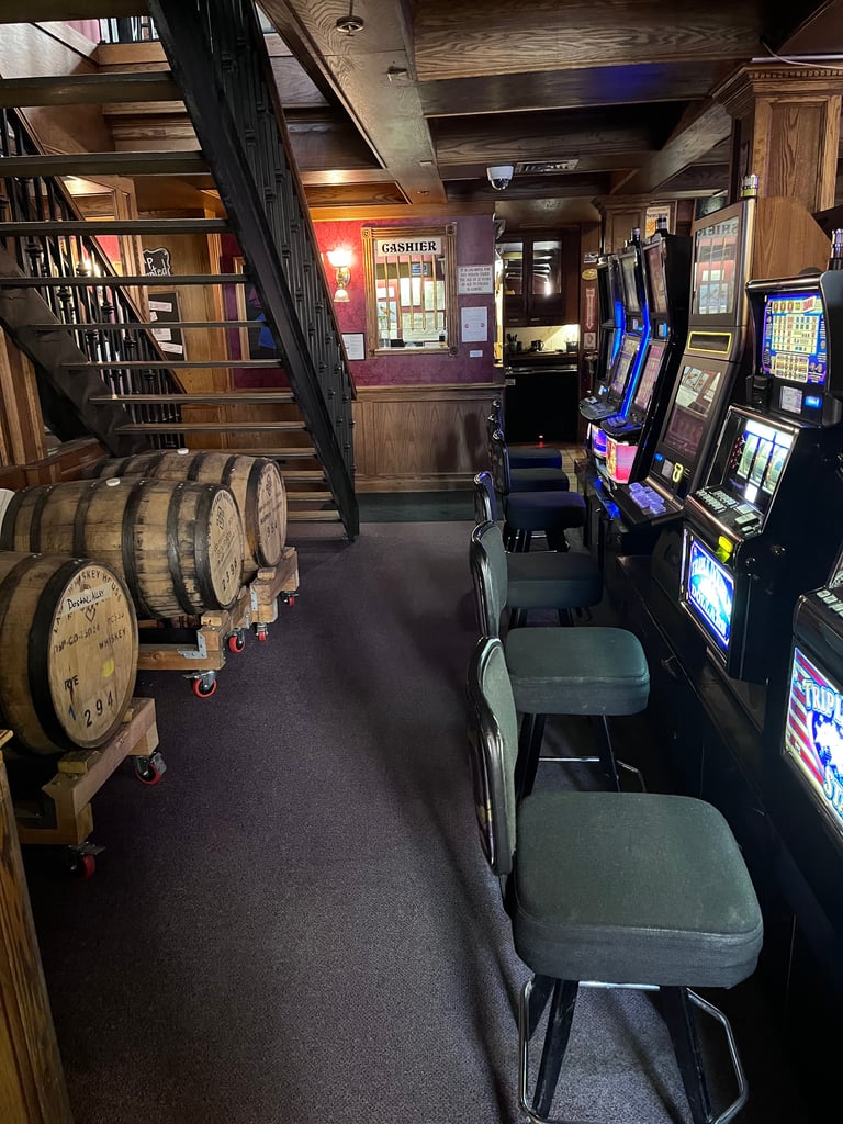 Casino games next to beer barrels