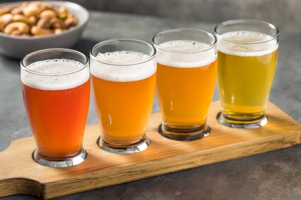 Beer Flight with peanuts behind it.