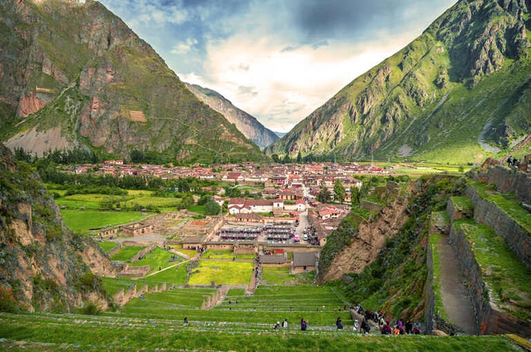 Ollantaytambo Ruins & Village in Peru's Sacred Valley amidst the Andes Mountains.