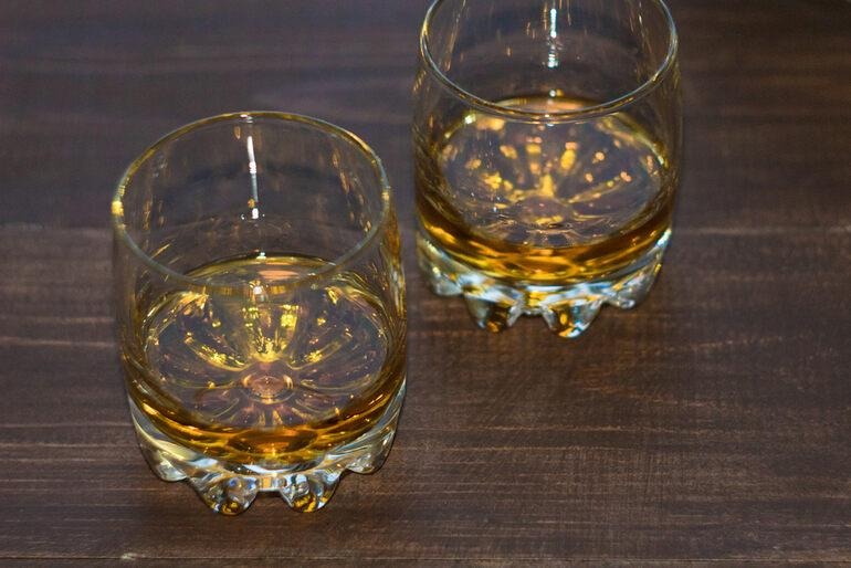 Two short whisky glasses.