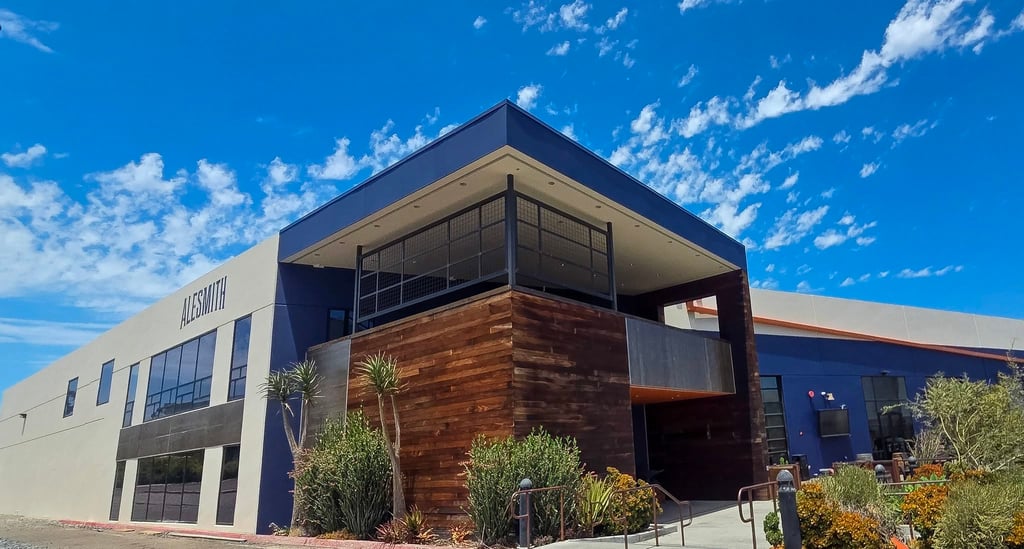 AleSmith Brewing Co. exterior facade under sunny skies.