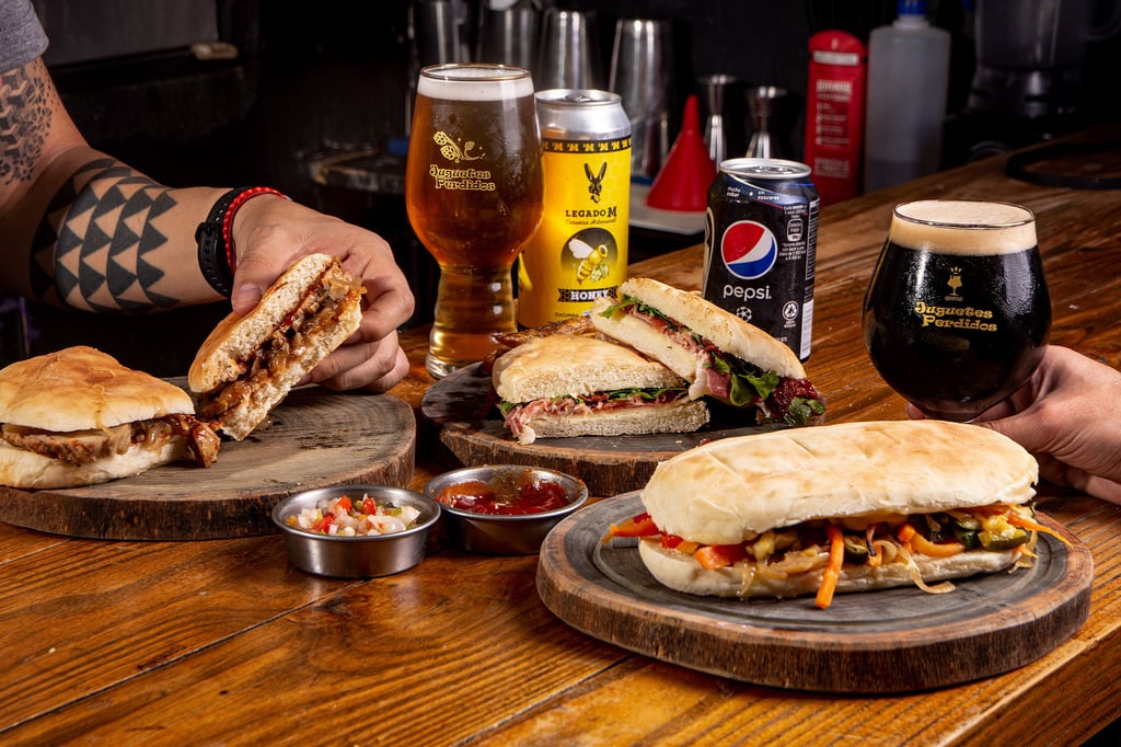 Selection of regional sandwiches next to corresponding beer pairings.