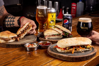 Selection of regional sandwiches next to corresponding beer pairings.