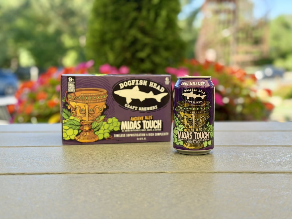 A can and pack of Midas Touch beer from Dogfish Head