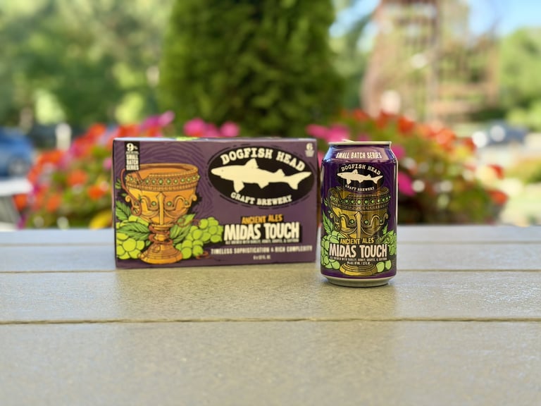 A can and pack of Midas Touch beer from Dogfish Head