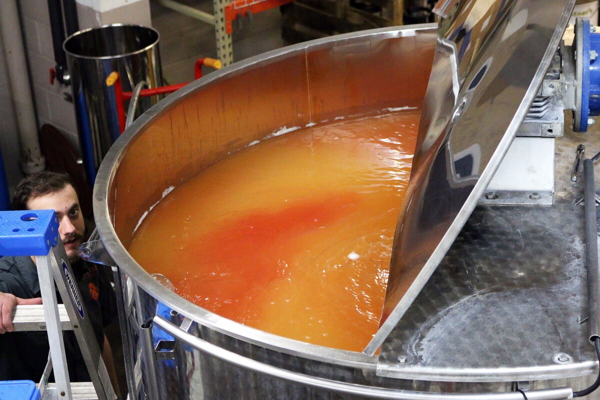 a swirling batch of mead in a fermentation tank
