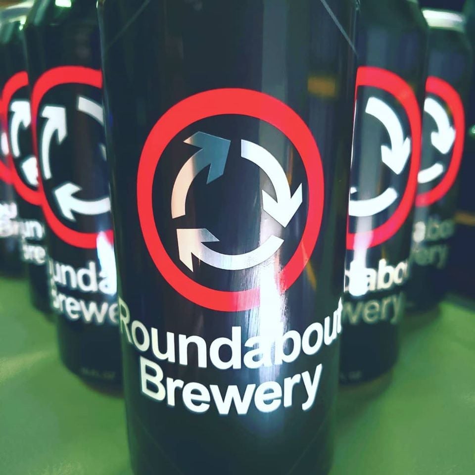 Roundabout Brewery logo on cans