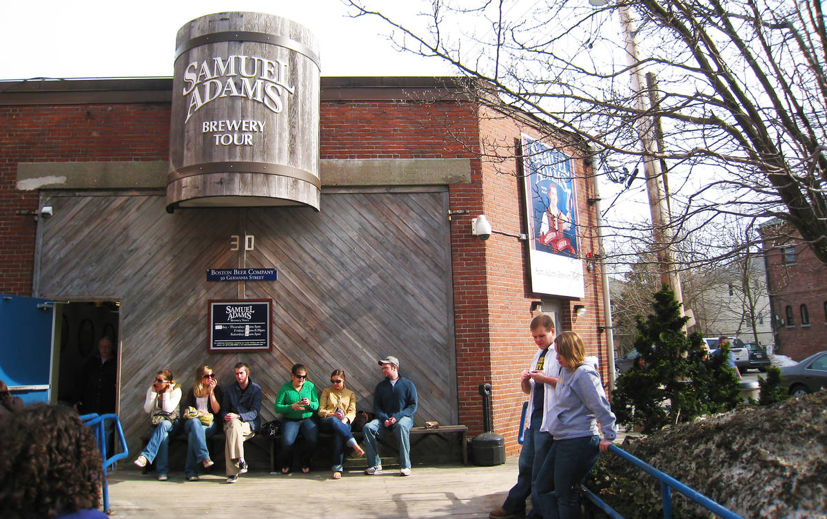 people waiting for a tour outside samuel adams brewery