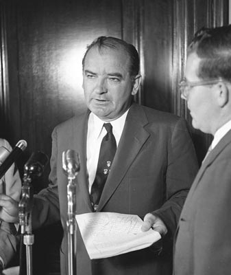 joseph mccarthy in front of microphones