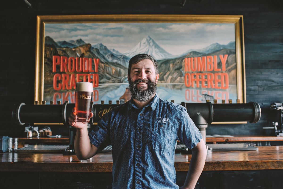 pFriem Family Brewers head brewer Josh Pfriem in front of inviting bar